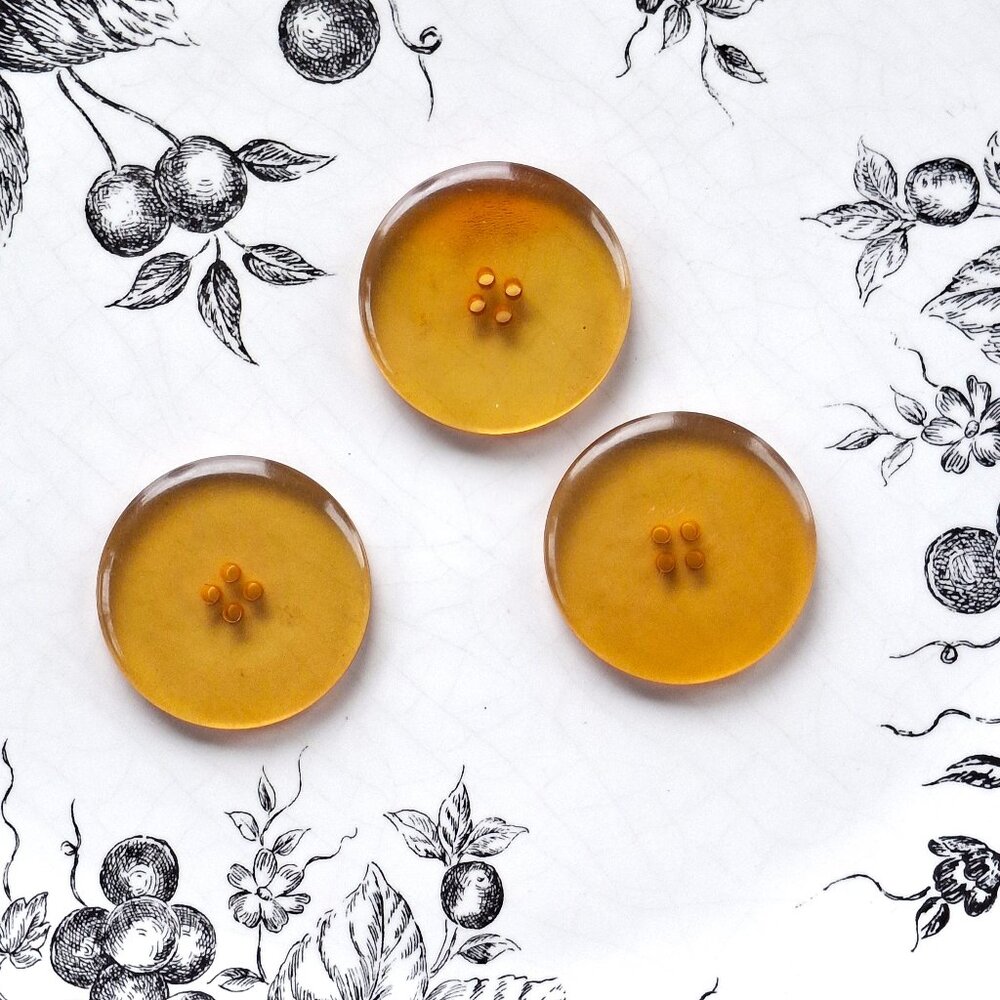 Large Vintage Apple Juice Bakelite Buttons